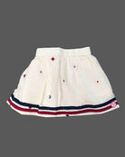 Toddler top and skirt set featuring jacket layer and embroidered details