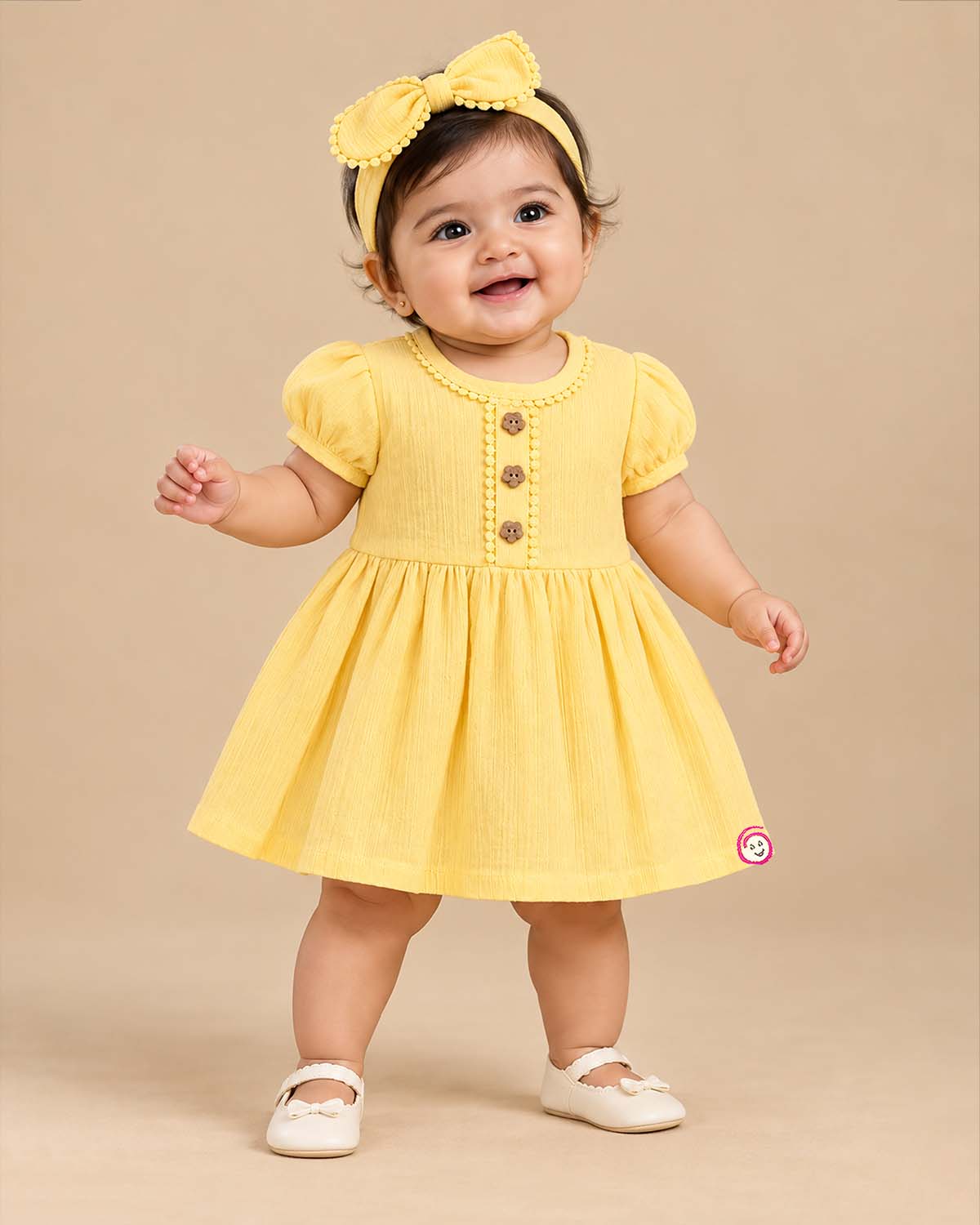 Infants frock in soft textured cotton fabric for casual playdates and baby clothes collection.