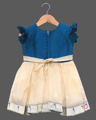 Infant cotton silk  frock in teal blue and cream with multicolored bird and floral kalamkari border work, neckline embroidery, and ruffle sleeves
