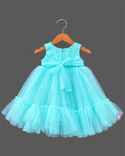 Infant net frock with sequined bodice and floral applique embellishments for kids party wear