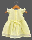 Frill sleeve organic casual frock with embroidered floral vines and baby casual wear dress styling details.