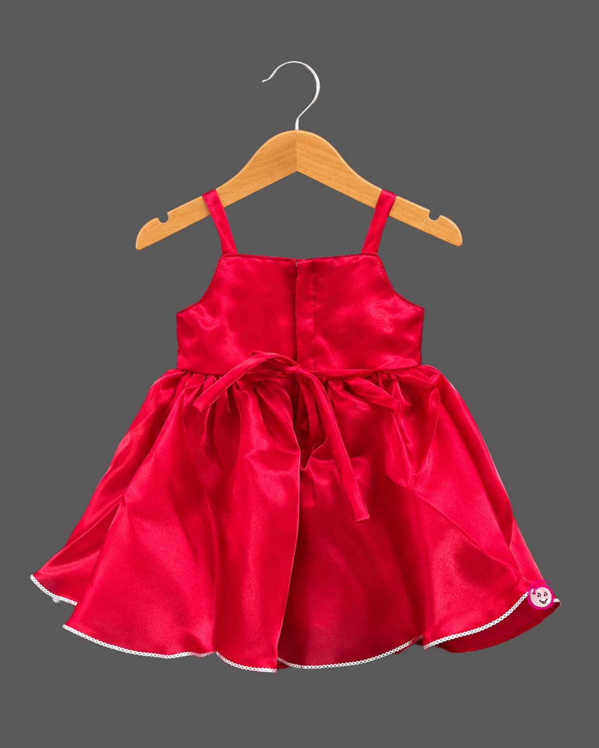Toddler satin party dress featuring a sequin bow accent and sleeveless straps