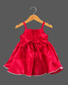 Toddler satin party dress featuring a sequin bow accent and sleeveless straps