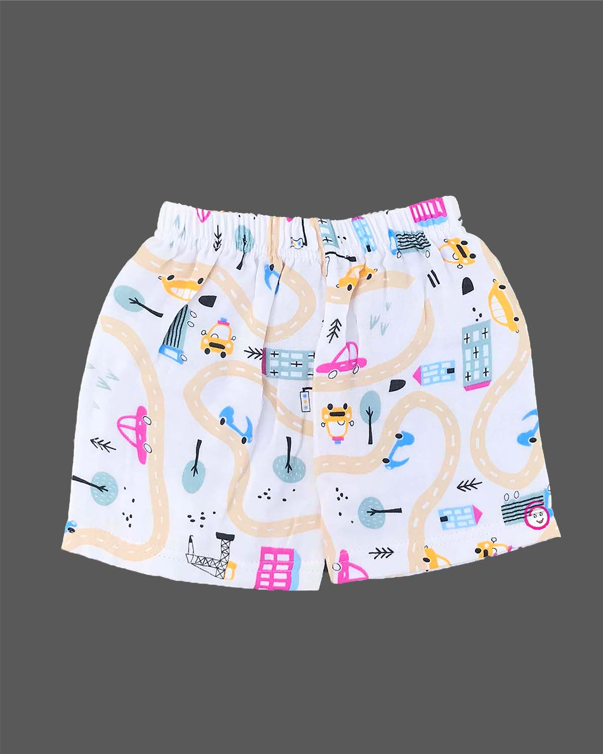 Boys 2-piece cotton casual co-ord set featuring a short-sleeve collared printed shirt and matching shorts in white with colorful cars, roads, and buildings print