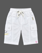 Toddler wearing short-sleeve button-down shirt and shorts designed for kids western wear.
