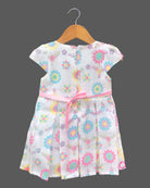 Little princess floral printed casual frock with pleated skirt and decorative waist flower for comfortable everyday kids fashion