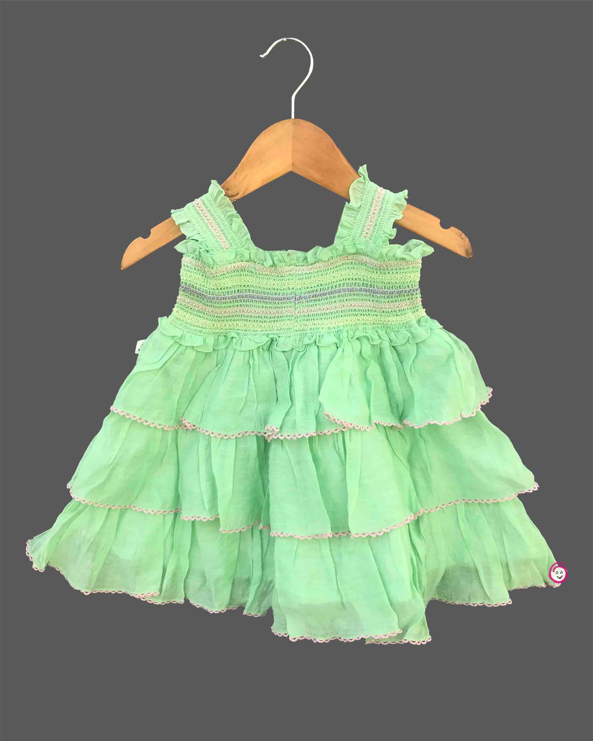 infant girls sleeveless smocked bodice tiered ruffle cotton frock with flower applique