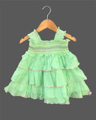 infant girls sleeveless smocked bodice tiered ruffle cotton frock with flower applique