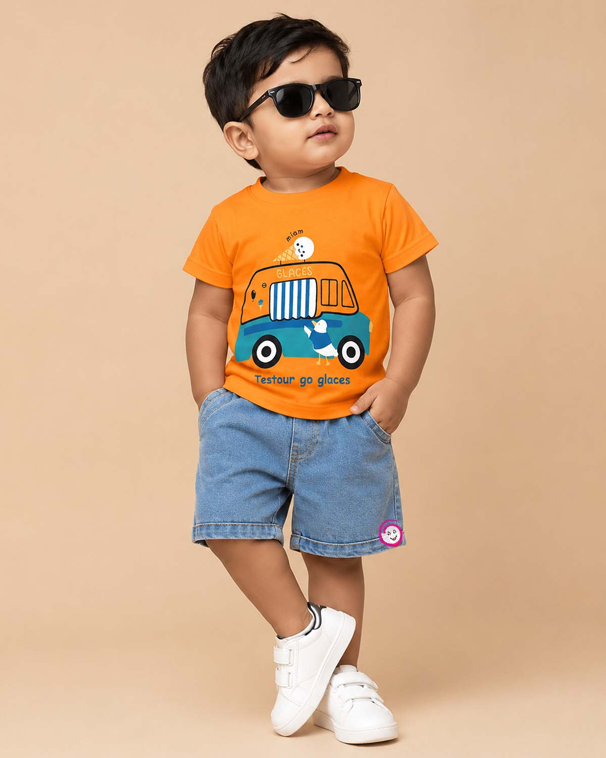 Bright orange graphic t-shirt with ice cream truck print and light wash blue denim elasticated shorts baby boy top and shorts set for summer vacations, playdates, and park outings