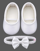 Kids party wear satin A-line frock with large rosette flower accents, matching headband, and soft booties set.