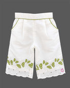 Sleeveless embroidered top with butterfly motifs and matching pleated pants with scalloped hems