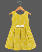 Toddler girl in mustard yellow cotton embroidered casual frock with off-white ruffled jacket