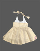 Little one wearing halter neck traditional ethnic dress with delicate lace waist trim and floral applique.