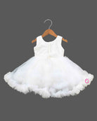 Toddler white net party gown with sequin bodice and bow applique