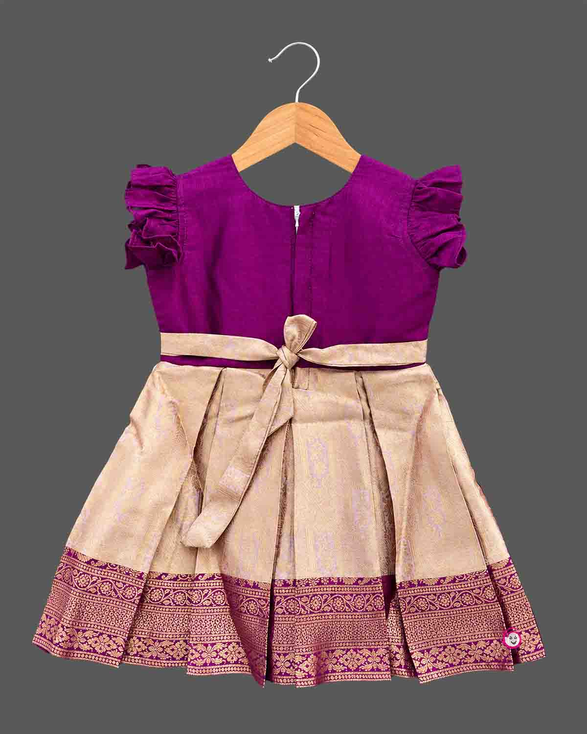 Girls embellished silk frock with embroidered round neck flutter sleeves and pleated zari skirt