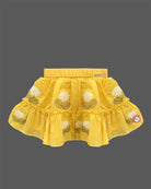 Cap sleeve top with lace flower motifs paired with a tiered embroidered skirt for a young fashionista