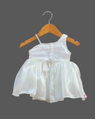 One shoulder baby party wear dress with embellished rosette bodice motif and flared organza skirt.