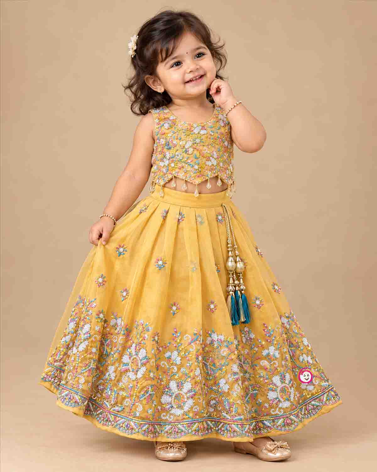 Kids sequined embroidered choli lehenga set with scalloped hem and hair accessory