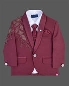 Boys tailored three-piece suit set featuring structured blazer, button-down shirt, and dress pant for events.
