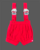 Red baby girl cotton knit suspender shorts with teddy bear stroller badges and white t-shirt with red bow and toy print