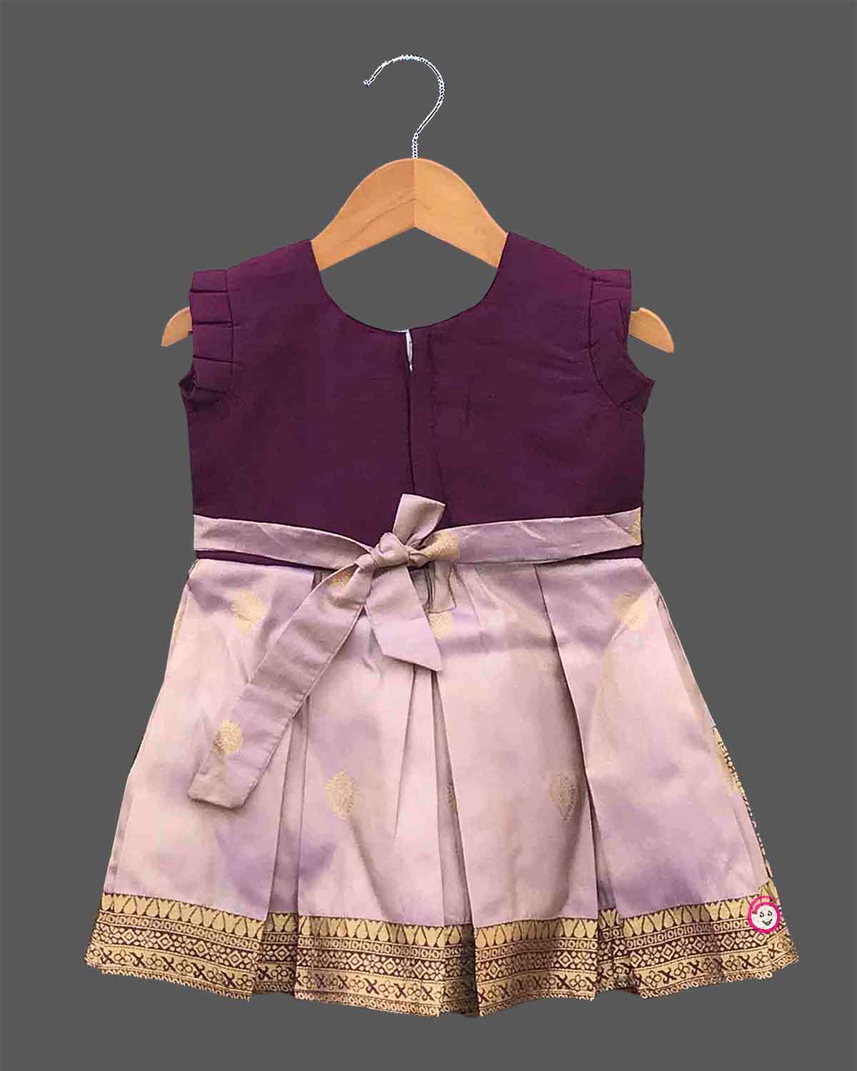 Girls silk embellished traditional frock featuring stone neckline handwork and zari pleated skirt