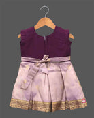 Girls silk embellished traditional frock featuring stone neckline handwork and zari pleated skirt