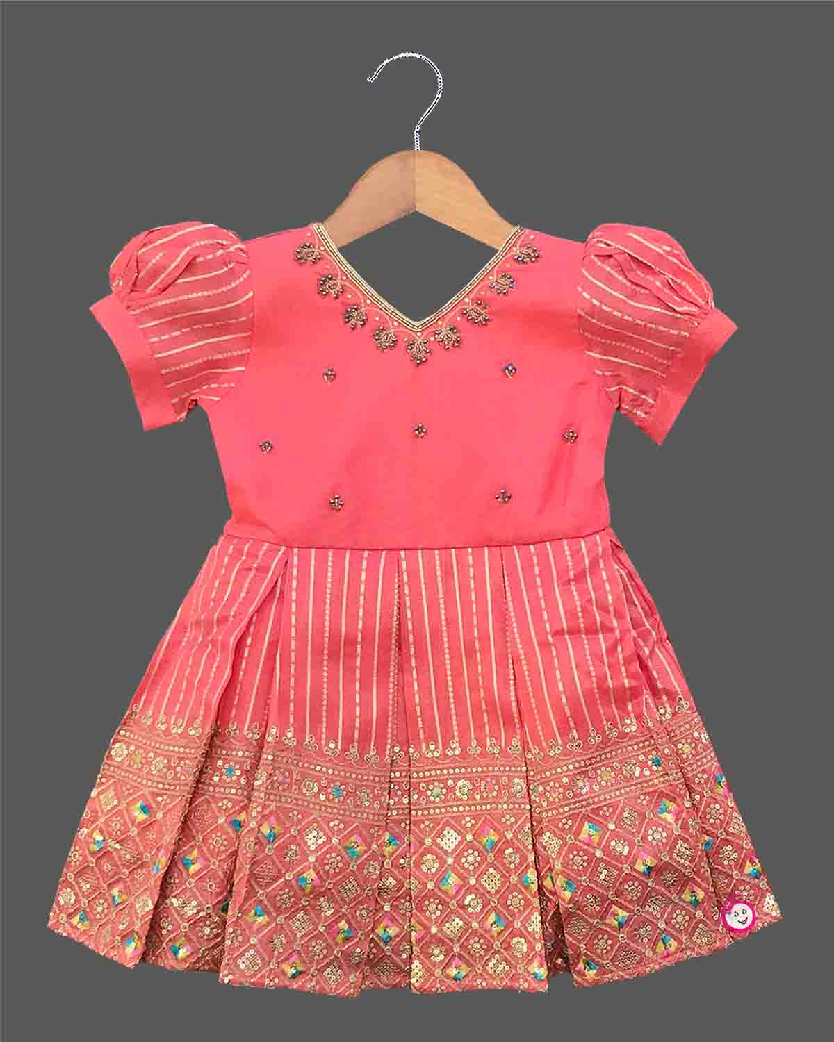 Infant cotton silk frock in peach pink with gold zari work and neckline embroidery for ear piercing ceremonies, festivals, temple visits, and weddings  
