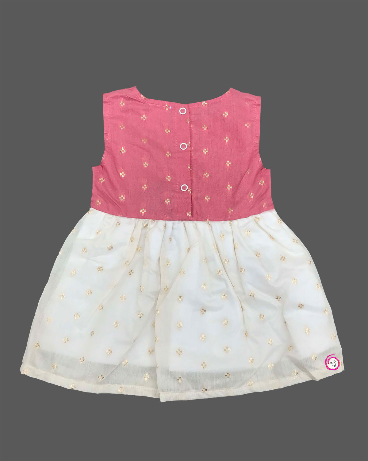 Traditional sleeveless festive attire for a little princess featuring subtle metallic buttis and a gathered flared skirt.