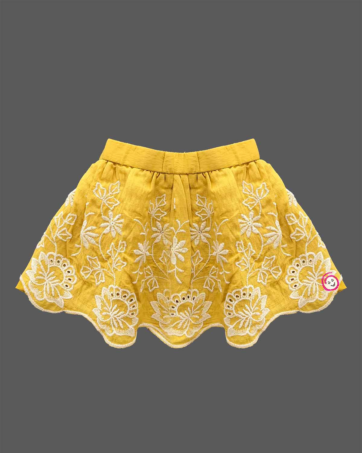 Baby girl in a stylish sleeveless western top and matching embroidered skirt set