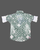 Trendy toddler boys casual chambray button-down shirt featuring an all-over monogram print and dual front chest pockets.