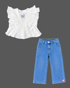 Ruffled top and denim pant baby party wear dress with embellished bow detail.
