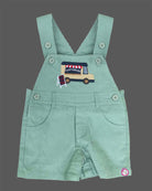 Playful young prince short sleeve vehicle pattern tee and bib shorts set for active kids
