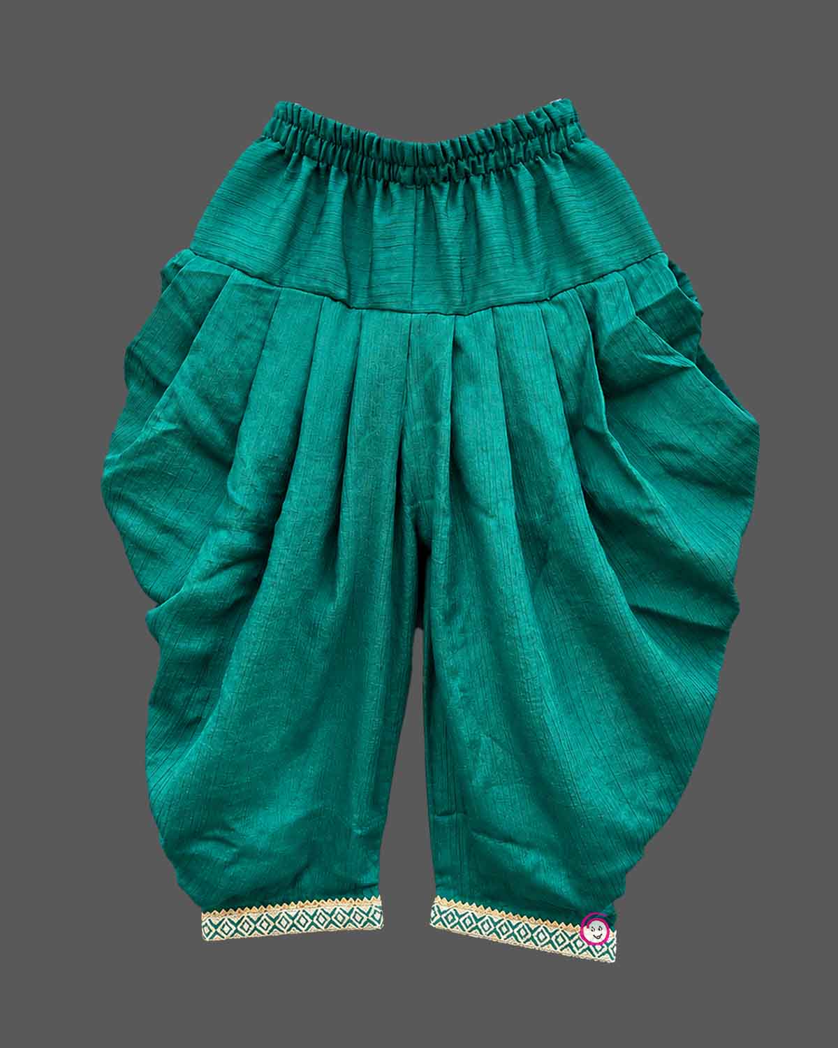 Sleeveless short kurti with attached embroidered jacket and pleated dhoti patiyala pants for kids[cite: 5].