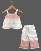 Baby girl embroidered cotton top and pant set featuring shoulder straps and matching wide leg pants for festive occasions