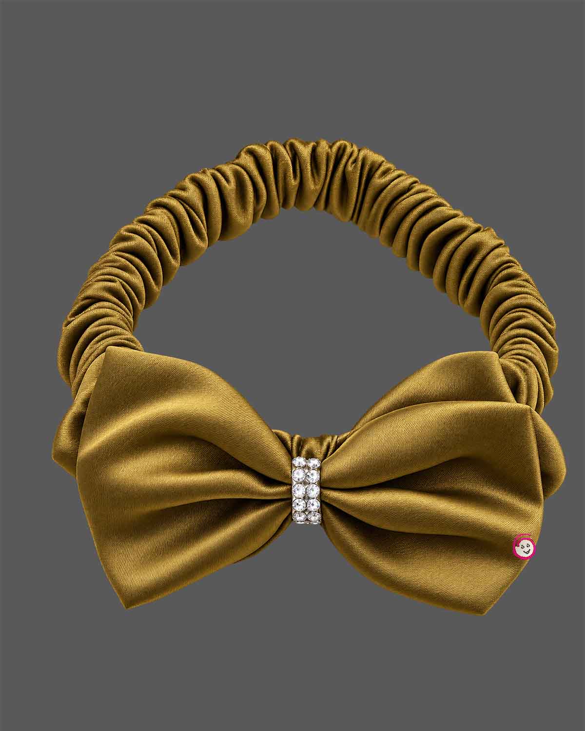 Mustard gold satin party frock for girls featuring an oversized front bow with rhinestone embellishment and flared pleats.