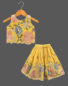 Embroidered lehenga choli for kids featuring scalloped floral sequin work and drawstring tassel ties