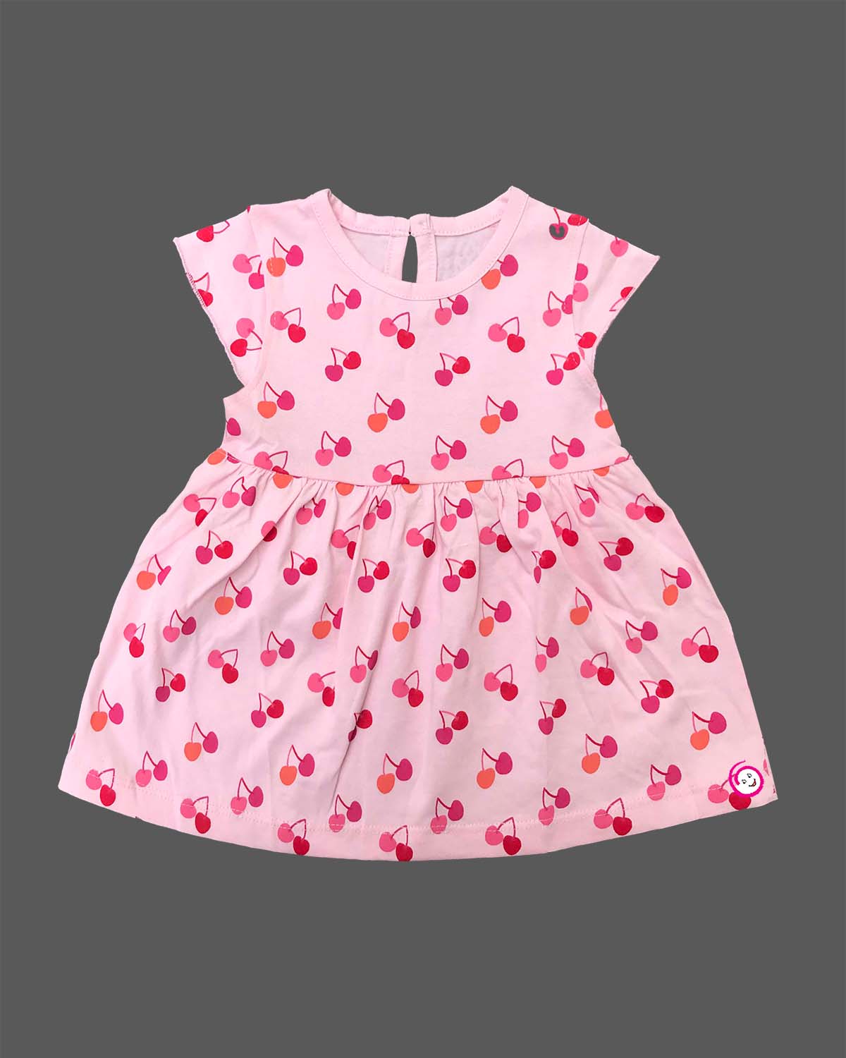 Infant cotton frock with short sleeves and cherry print for casual wear