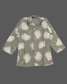 Baby boy ethnic kurta pant set featuring botanical leaf prints, mandarin collar, and roll-up sleeves.