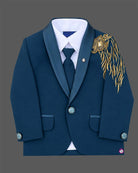 Boys embroidered tuxedo suit set featuring metallic shoulder embroidery, satin shawl lapel blazer, tie, and pant.