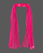 Kids sharara set featuring strappy embroidered top with mirror work trim and wide flared palazzo pants.