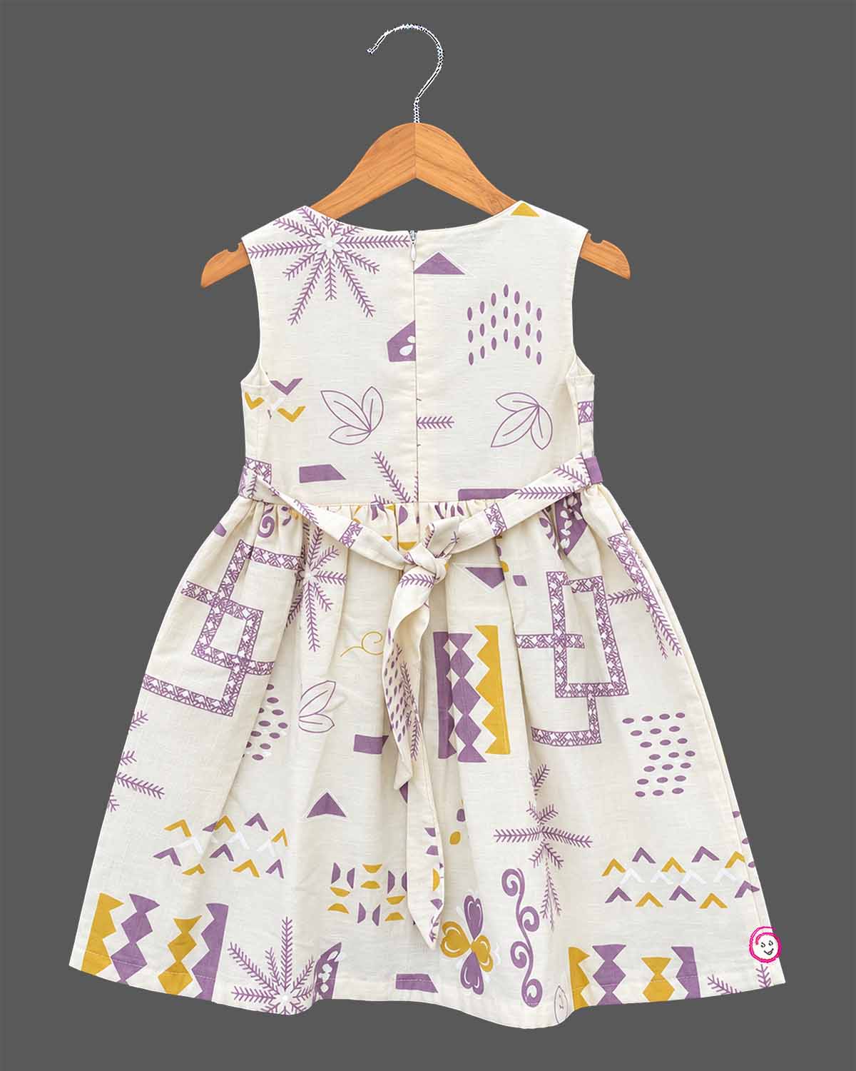Little girl purple and off-white printed cotton casual frock with attached short sleeve jacket and floral brooch