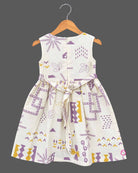 Little girl purple and off-white printed cotton casual frock with attached short sleeve jacket and floral brooch
