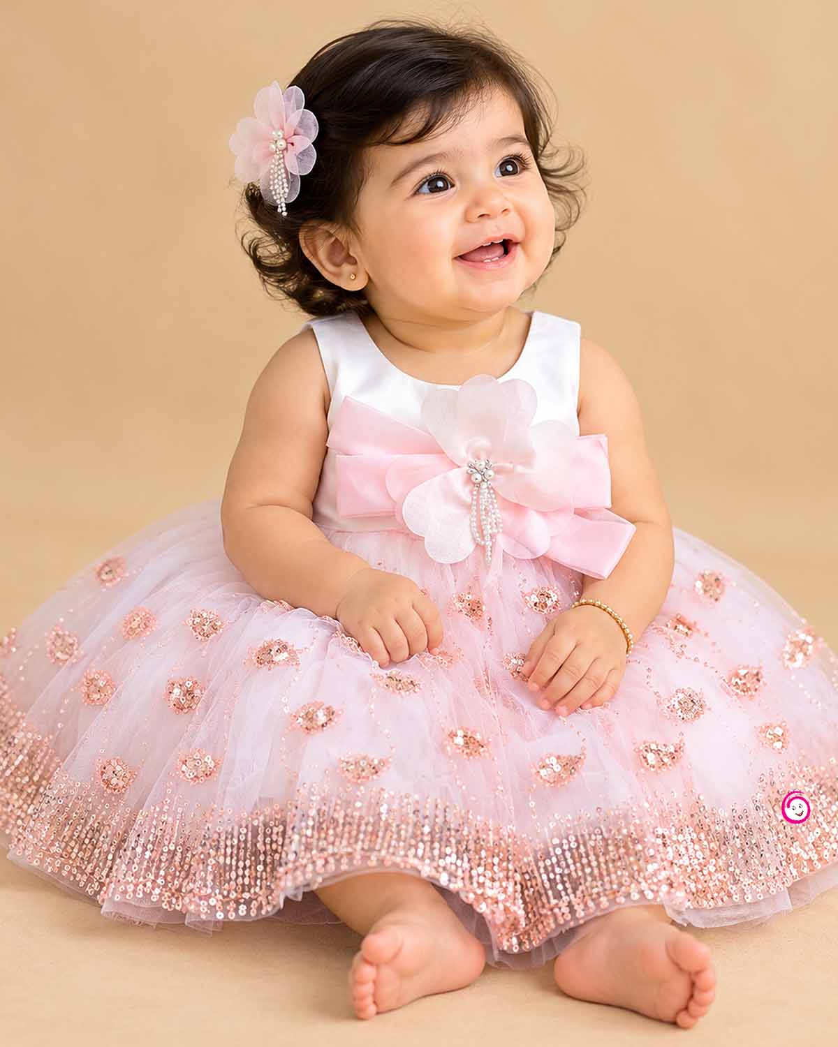 Sleeveless party frock with flower appliques, sequin motifs, and flared tulle skirt