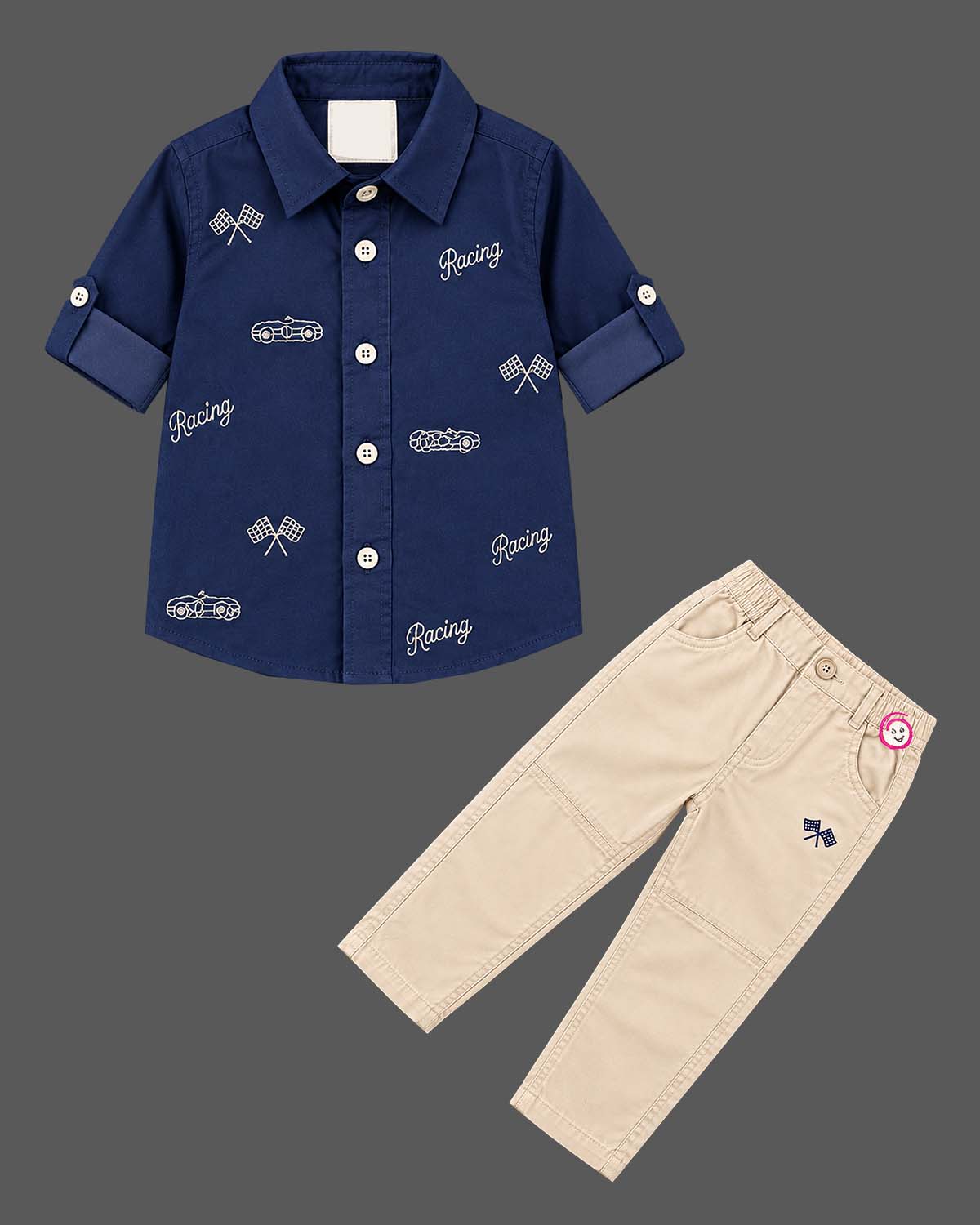 Boys collared button-down shirt and pant set serving as an indo western dress for boys with embroidered motifs.