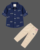 Boys collared button-down shirt and pant set serving as an indo western dress for boys with embroidered motifs.