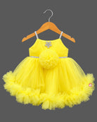 Ruffled tulle baby party wear dress with embellished straps, pom-pom detail, booties, headband