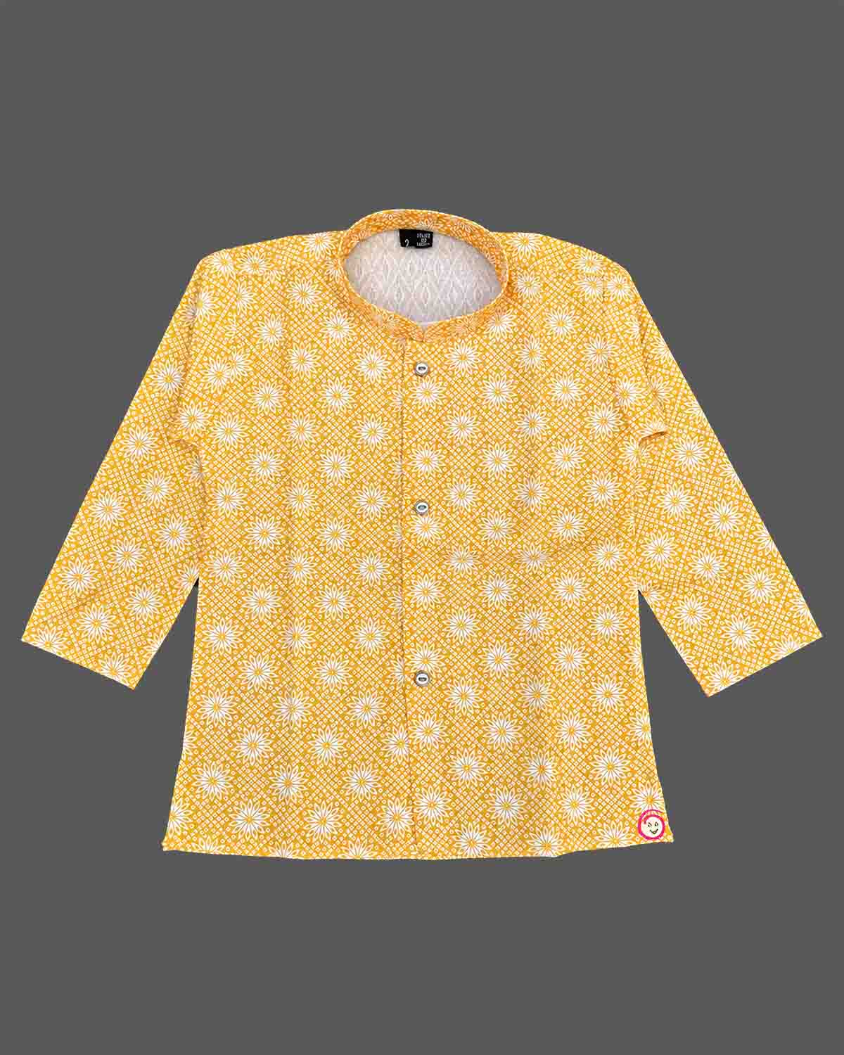 Baby boy printed ethnic kurta and dhoti pant set with mandarin collar and front placket buttons for pooja celebrations.