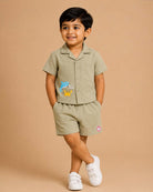 Sage green textured cotton button-down shirt with dolphin and crab embroidery baby boy top and shorts set for summer vacations, playdates, and park outings