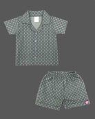 Comfortable geometric patterned shirt and shorts set for boys.