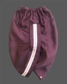 Boys lilac ethnic full sleeve kurta with auto embroidery motifs and mandarin collar paired with wine elastic waist dhoti pant